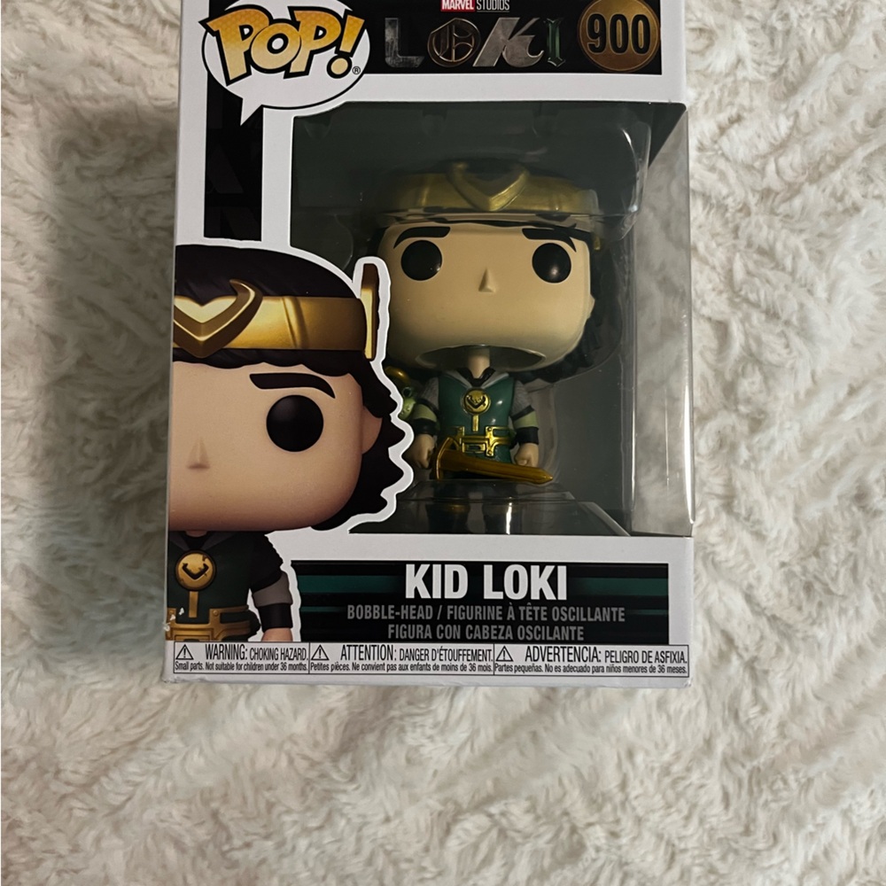 Funko Kid Loki Figure with Gold and Green Details